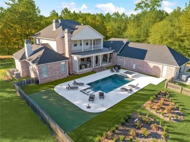 Nestled within the gates of Money Hill, this stunning two-story on Money Hill Golf and Country Club in Louisiana - for sale on GolfHomes.com, golf home, golf lot