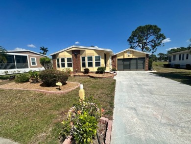 Lot rent is $1342.00 monthly  This well cared for 2 bedrooms/2 on Del Tura Golf and Country Club in Florida - for sale on GolfHomes.com, golf home, golf lot