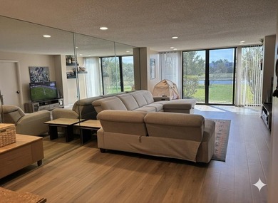 Welcome to your dream living space! Nestled in a serene all-age on Fountains Golf and Country Club in Florida - for sale on GolfHomes.com, golf home, golf lot