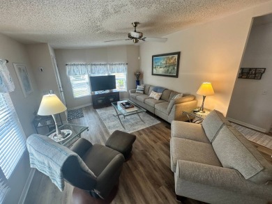 Lot rent is $1342.00 monthly  This well cared for 2 bedrooms/2 on Del Tura Golf and Country Club in Florida - for sale on GolfHomes.com, golf home, golf lot