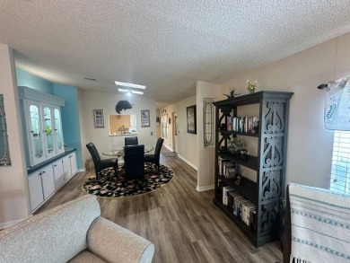 Lot rent is $1342.00 monthly  This well cared for 2 bedrooms/2 on Del Tura Golf and Country Club in Florida - for sale on GolfHomes.com, golf home, golf lot