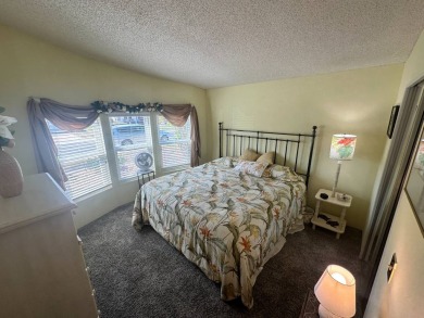 Lot rent is $1342.00 monthly  This well cared for 2 bedrooms/2 on Del Tura Golf and Country Club in Florida - for sale on GolfHomes.com, golf home, golf lot