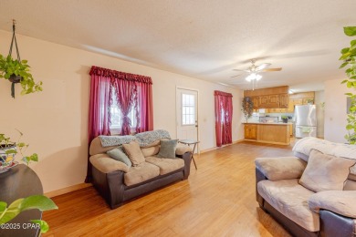 Beach Bungalow is located in the quaint neighborhood of Beach 87 on Sharks Tooth Golf Club in Florida - for sale on GolfHomes.com, golf home, golf lot