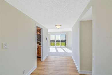 Perched atop the prestigious Belleair Country Club, this on Belleair Country Club in Florida - for sale on GolfHomes.com, golf home, golf lot