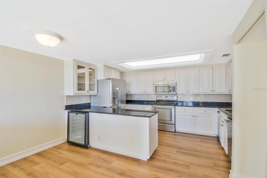 Perched atop the prestigious Belleair Country Club, this on Belleair Country Club in Florida - for sale on GolfHomes.com, golf home, golf lot