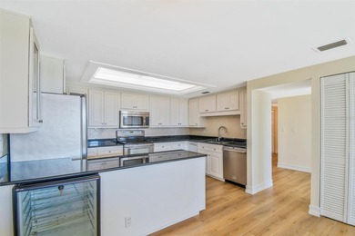 Perched atop the prestigious Belleair Country Club, this on Belleair Country Club in Florida - for sale on GolfHomes.com, golf home, golf lot