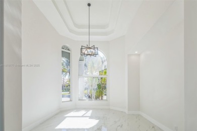 Complete modern remodeling. New Roof with 3 solar fans, Full on Heron Bay Golf Club in Florida - for sale on GolfHomes.com, golf home, golf lot