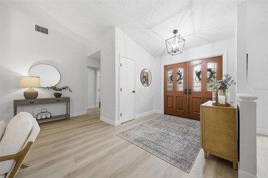 Stunning 3BR/2BA + Bonus Room, Pool Home in Gated East Lake on East Lake Woodlands Country Club in Florida - for sale on GolfHomes.com, golf home, golf lot