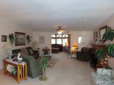 This great home has one of the best curb appeals in the entire on Crane Lakes Golf and Country Club in Florida - for sale on GolfHomes.com, golf home, golf lot