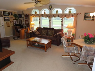 This great home has one of the best curb appeals in the entire on Crane Lakes Golf and Country Club in Florida - for sale on GolfHomes.com, golf home, golf lot