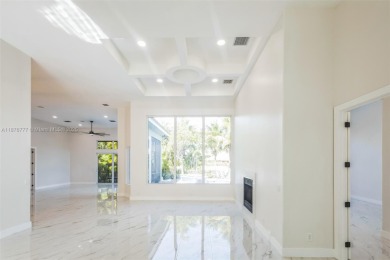 Complete modern remodeling. New Roof with 3 solar fans, Full on Heron Bay Golf Club in Florida - for sale on GolfHomes.com, golf home, golf lot