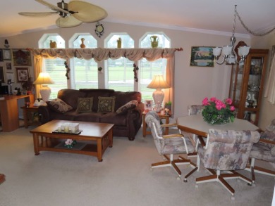 This great home has one of the best curb appeals in the entire on Crane Lakes Golf and Country Club in Florida - for sale on GolfHomes.com, golf home, golf lot