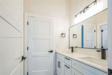 Complete modern remodeling. New Roof with 3 solar fans, Full on Heron Bay Golf Club in Florida - for sale on GolfHomes.com, golf home, golf lot