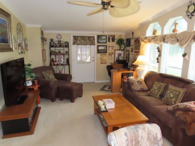 This great home has one of the best curb appeals in the entire on Crane Lakes Golf and Country Club in Florida - for sale on GolfHomes.com, golf home, golf lot
