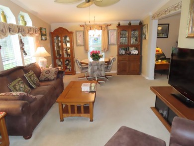 This great home has one of the best curb appeals in the entire on Crane Lakes Golf and Country Club in Florida - for sale on GolfHomes.com, golf home, golf lot
