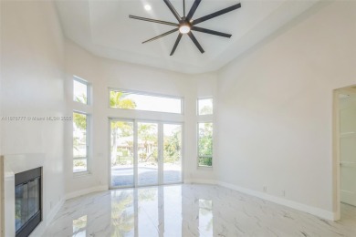 Complete modern remodeling. New Roof with 3 solar fans, Full on Heron Bay Golf Club in Florida - for sale on GolfHomes.com, golf home, golf lot
