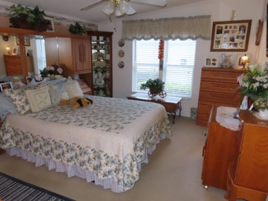 This great home has one of the best curb appeals in the entire on Crane Lakes Golf and Country Club in Florida - for sale on GolfHomes.com, golf home, golf lot