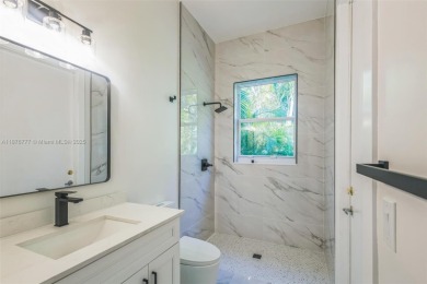 Complete modern remodeling. New Roof with 3 solar fans, Full on Heron Bay Golf Club in Florida - for sale on GolfHomes.com, golf home, golf lot