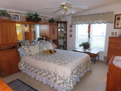 This great home has one of the best curb appeals in the entire on Crane Lakes Golf and Country Club in Florida - for sale on GolfHomes.com, golf home, golf lot