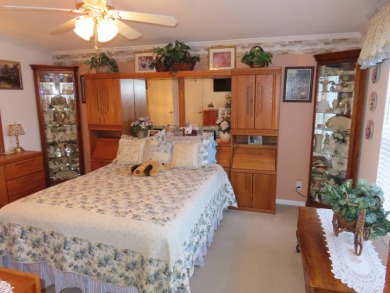 This great home has one of the best curb appeals in the entire on Crane Lakes Golf and Country Club in Florida - for sale on GolfHomes.com, golf home, golf lot