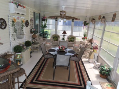 This great home has one of the best curb appeals in the entire on Crane Lakes Golf and Country Club in Florida - for sale on GolfHomes.com, golf home, golf lot