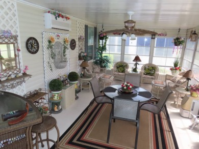 This great home has one of the best curb appeals in the entire on Crane Lakes Golf and Country Club in Florida - for sale on GolfHomes.com, golf home, golf lot