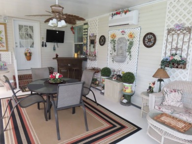 This great home has one of the best curb appeals in the entire on Crane Lakes Golf and Country Club in Florida - for sale on GolfHomes.com, golf home, golf lot