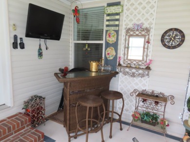 This great home has one of the best curb appeals in the entire on Crane Lakes Golf and Country Club in Florida - for sale on GolfHomes.com, golf home, golf lot
