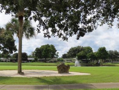 This great home has one of the best curb appeals in the entire on Crane Lakes Golf and Country Club in Florida - for sale on GolfHomes.com, golf home, golf lot