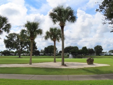 This great home has one of the best curb appeals in the entire on Crane Lakes Golf and Country Club in Florida - for sale on GolfHomes.com, golf home, golf lot