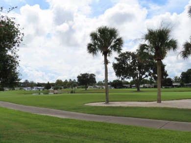 This great home has one of the best curb appeals in the entire on Crane Lakes Golf and Country Club in Florida - for sale on GolfHomes.com, golf home, golf lot