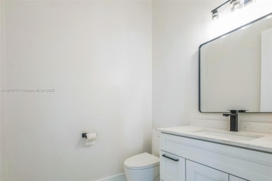 Complete modern remodeling. New Roof with 3 solar fans, Full on Heron Bay Golf Club in Florida - for sale on GolfHomes.com, golf home, golf lot