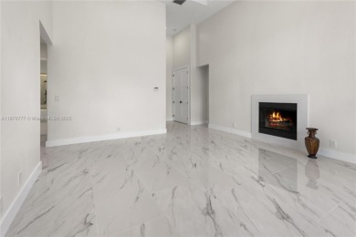 Complete modern remodeling. New Roof with 3 solar fans, Full on Heron Bay Golf Club in Florida - for sale on GolfHomes.com, golf home, golf lot