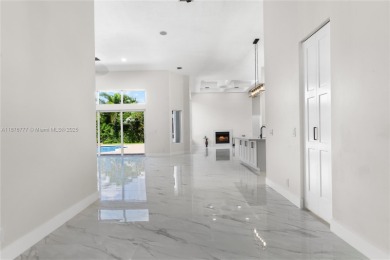 Complete modern remodeling. New Roof with 3 solar fans, Full on Heron Bay Golf Club in Florida - for sale on GolfHomes.com, golf home, golf lot