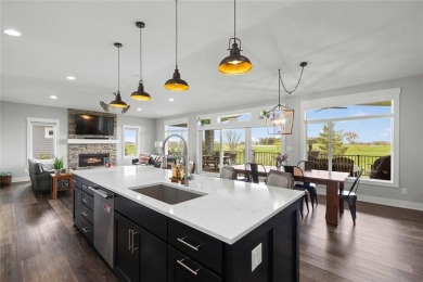 This zero-entry ranch home offers a blend of comfort and modern on Otter Creek Golf Course in Iowa - for sale on GolfHomes.com, golf home, golf lot