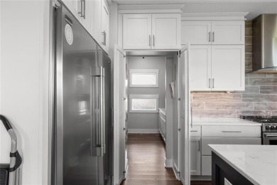 This zero-entry ranch home offers a blend of comfort and modern on Otter Creek Golf Course in Iowa - for sale on GolfHomes.com, golf home, golf lot