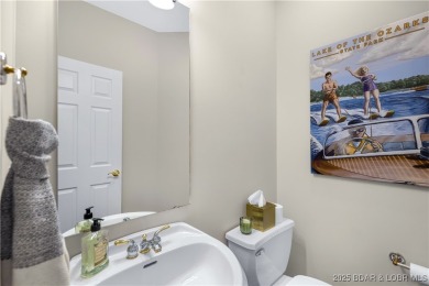 LAKE OF THE OZARKS - This exceptional townhome, nestled in the on The Club At Porto Cima in Missouri - for sale on GolfHomes.com, golf home, golf lot