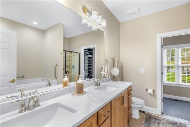 LAKE OF THE OZARKS - This exceptional townhome, nestled in the on The Club At Porto Cima in Missouri - for sale on GolfHomes.com, golf home, golf lot