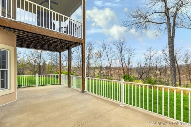 LAKE OF THE OZARKS - This exceptional townhome, nestled in the on The Club At Porto Cima in Missouri - for sale on GolfHomes.com, golf home, golf lot