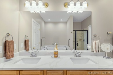 LAKE OF THE OZARKS - This exceptional townhome, nestled in the on The Club At Porto Cima in Missouri - for sale on GolfHomes.com, golf home, golf lot