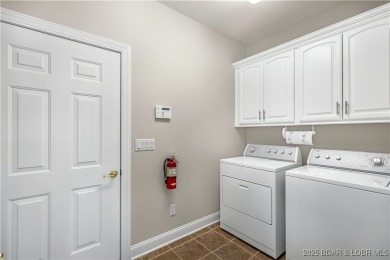 LAKE OF THE OZARKS - This exceptional townhome, nestled in the on The Club At Porto Cima in Missouri - for sale on GolfHomes.com, golf home, golf lot
