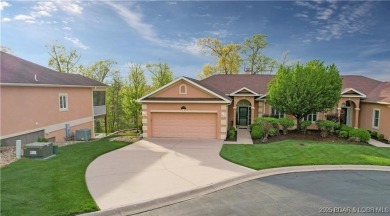 LAKE OF THE OZARKS - This exceptional townhome, nestled in the on The Club At Porto Cima in Missouri - for sale on GolfHomes.com, golf home, golf lot