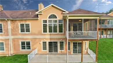 LAKE OF THE OZARKS - This exceptional townhome, nestled in the on The Club At Porto Cima in Missouri - for sale on GolfHomes.com, golf home, golf lot