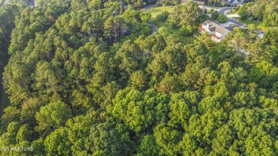 Nestled in the heart of Tellico Village, this extra large (over on Toqua Golf Course - Loudon County in Tennessee - for sale on GolfHomes.com, golf home, golf lot