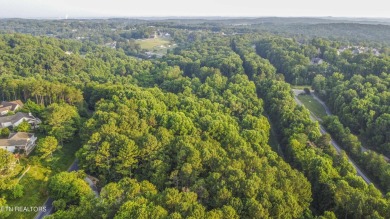 Nestled in the heart of Tellico Village, this extra large (over on Toqua Golf Course - Loudon County in Tennessee - for sale on GolfHomes.com, golf home, golf lot