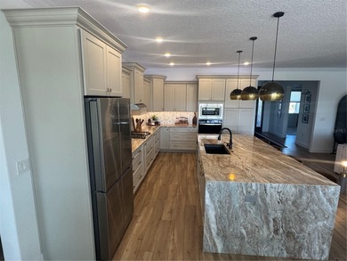 *Your Private Oasis Awaits: Stunning Golf Course Home with on On Top of the World Golf Course in Florida - for sale on GolfHomes.com, golf home, golf lot