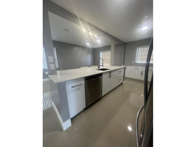 Beautifully updated and modern 2br/2ba home in Leisureville with on Leisureville Community Golf Course in Florida - for sale on GolfHomes.com, golf home, golf lot