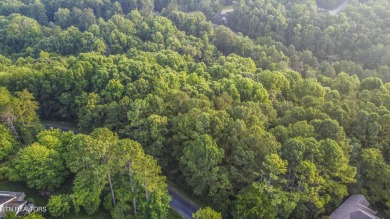 Nestled in the heart of Tellico Village, this extra large (over on Toqua Golf Course - Loudon County in Tennessee - for sale on GolfHomes.com, golf home, golf lot