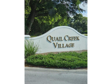 Step inside this spacious and very private two-story *Aberdeen* on Quail Village Golf Course in Florida - for sale on GolfHomes.com, golf home, golf lot