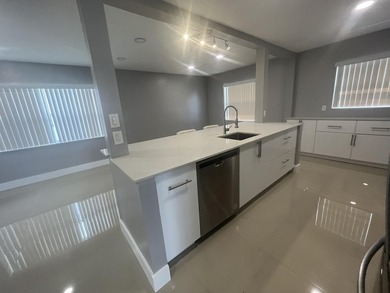 Beautifully updated and modern 2br/2ba home in Leisureville with on Leisureville Community Golf Course in Florida - for sale on GolfHomes.com, golf home, golf lot